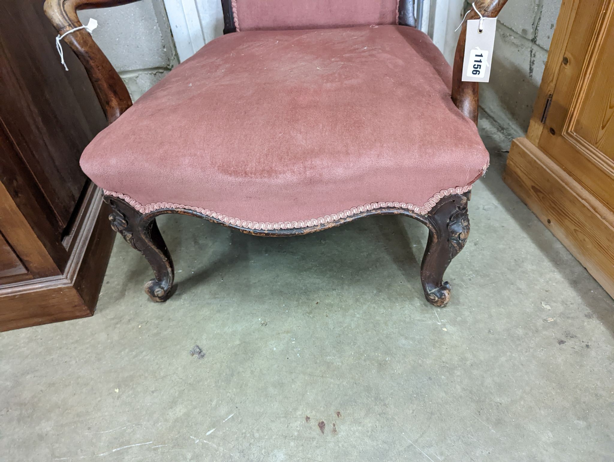 A Victorian mahogany open armchair, width 63cm, depth 70cm, height 94cm